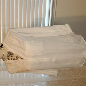 Ivory white half-sleeve blouse with front buttons.Very light Polka-dot stitching